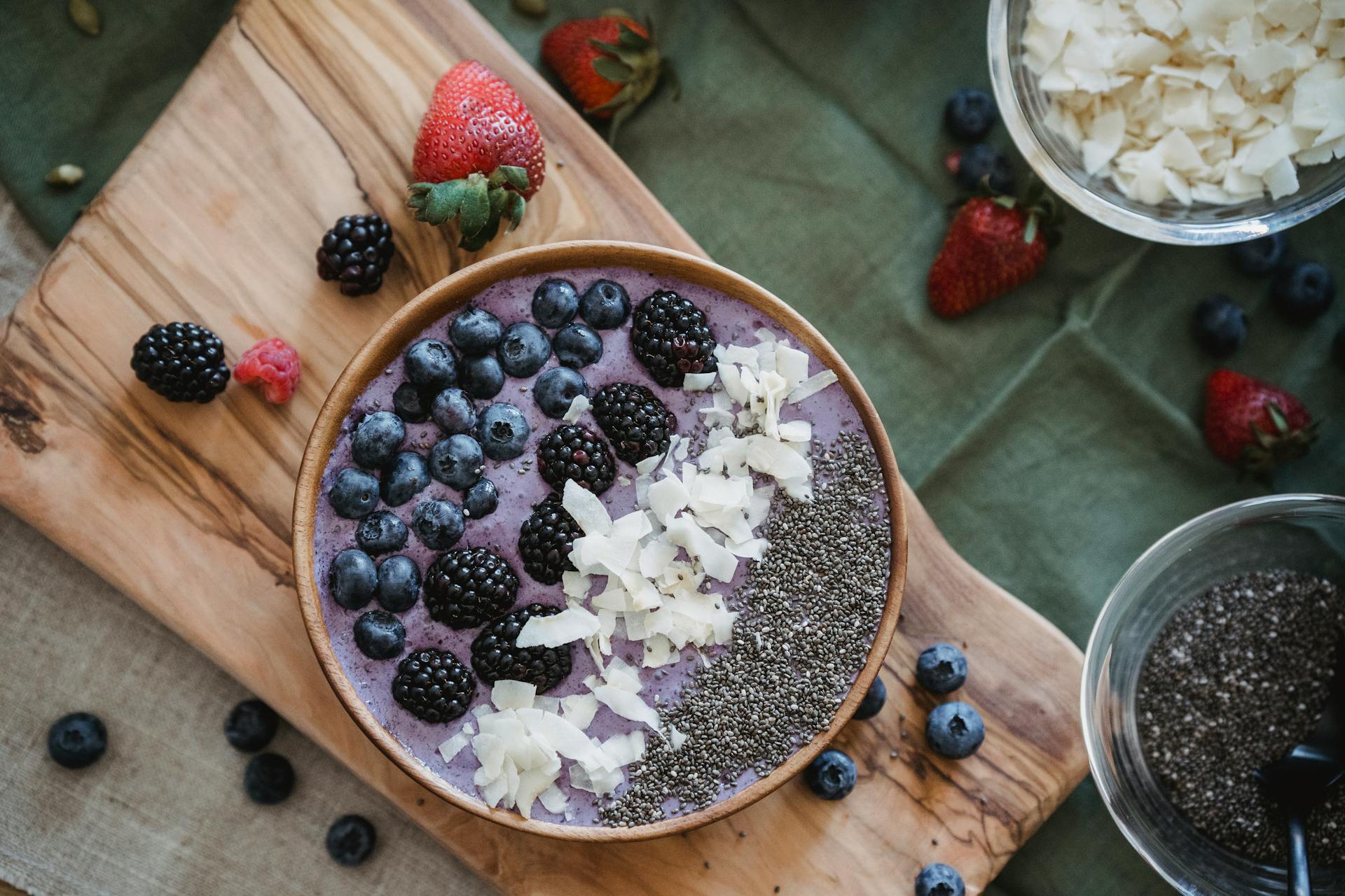 Dry chia seeds and coconut shreds in a smoothie bowl healthy wellness